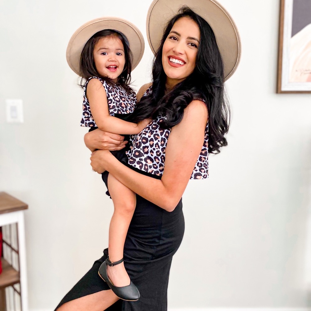 Beautiful mommy & me leopard matching dresses.You get both outfits for the price